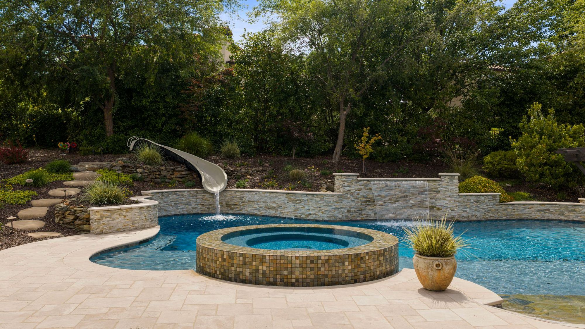 Slide, waterfall and spa running